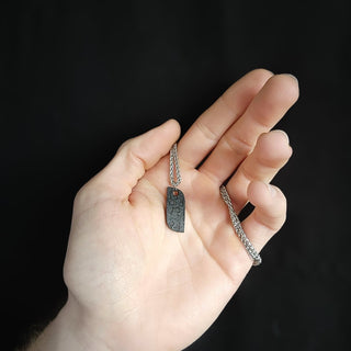 Black Stainless Steel Pendant in Palm