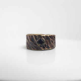 Textured brass ring with black gemstone