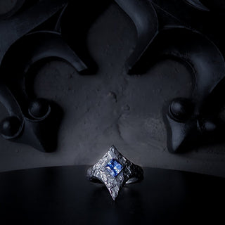 Black Stainless Steel Star Ring with a Sapphire set in the middle