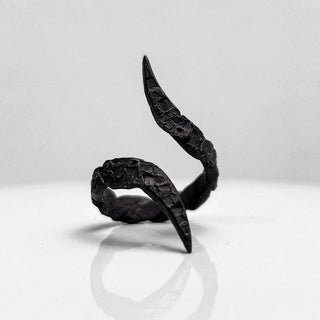 Black gothic textured stainless steel ring with curled and pointed edges