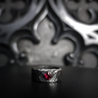 Black hammered stainless steel ring with ruby gemstone