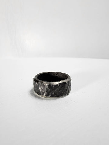 Black hammered stainless steel ring with ruby gemstone