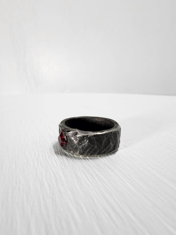 Black hammered stainless steel ring with ruby gemstone