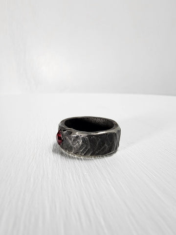 Black hammered stainless steel ring with ruby gemstone