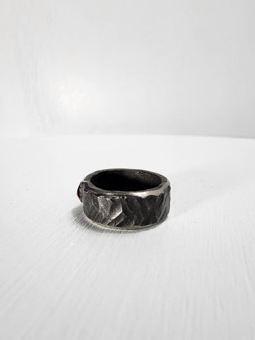 Black hammered stainless steel ring with ruby gemstone