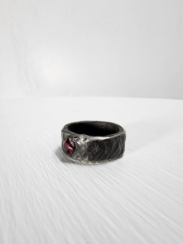 Black hammered stainless steel ring with ruby gemstone